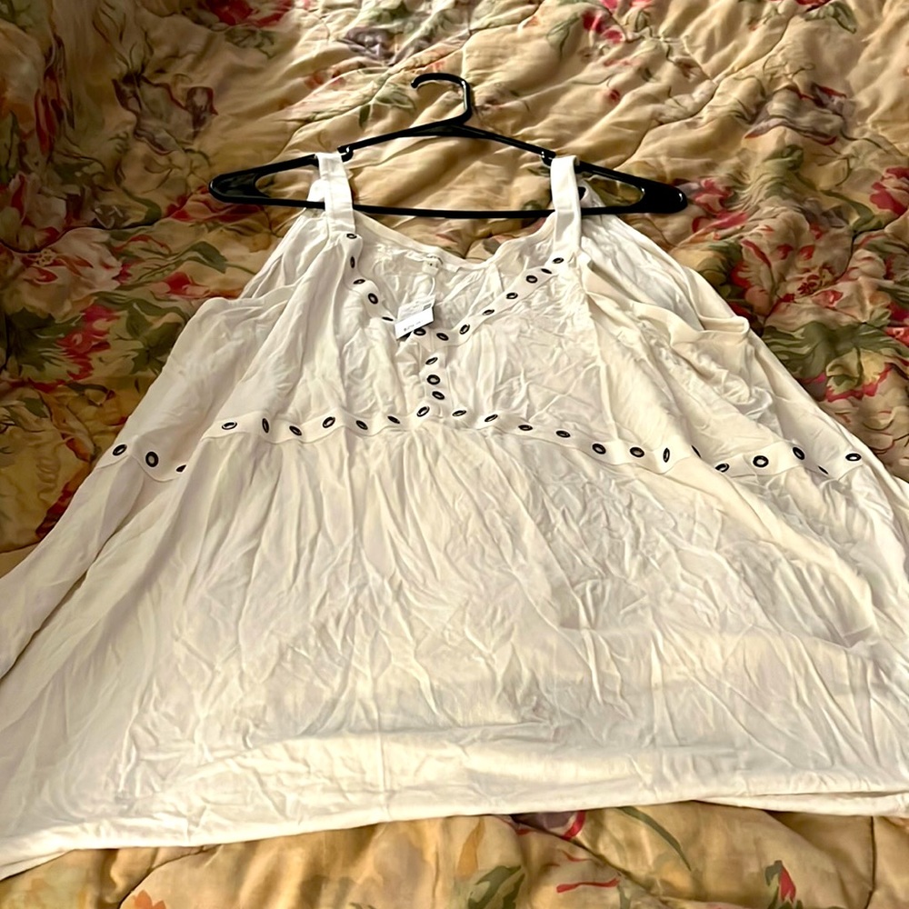 Super cute brand new. Cream tee. Tags attached